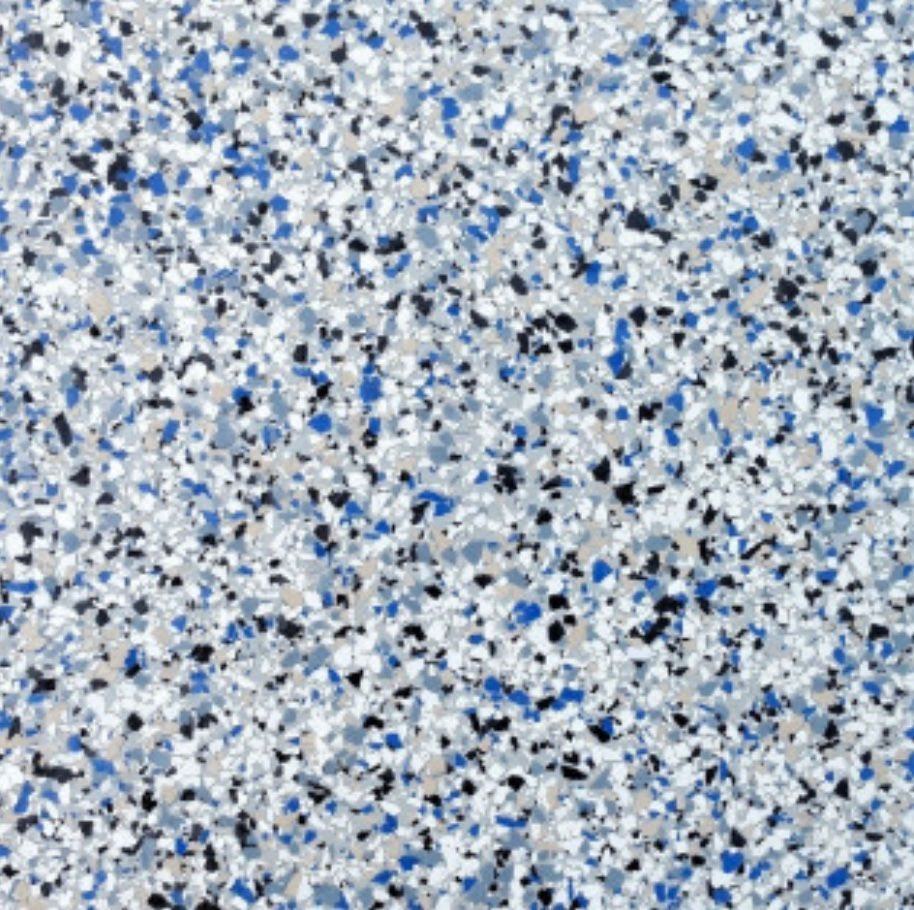 Diamond grinding a concrete slab before coating
